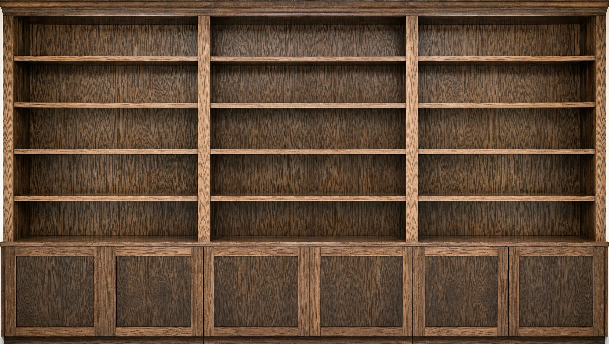Custom dark-oak floor-to-ceiling built-in library by Fogg Carpentry in Rockville, MD