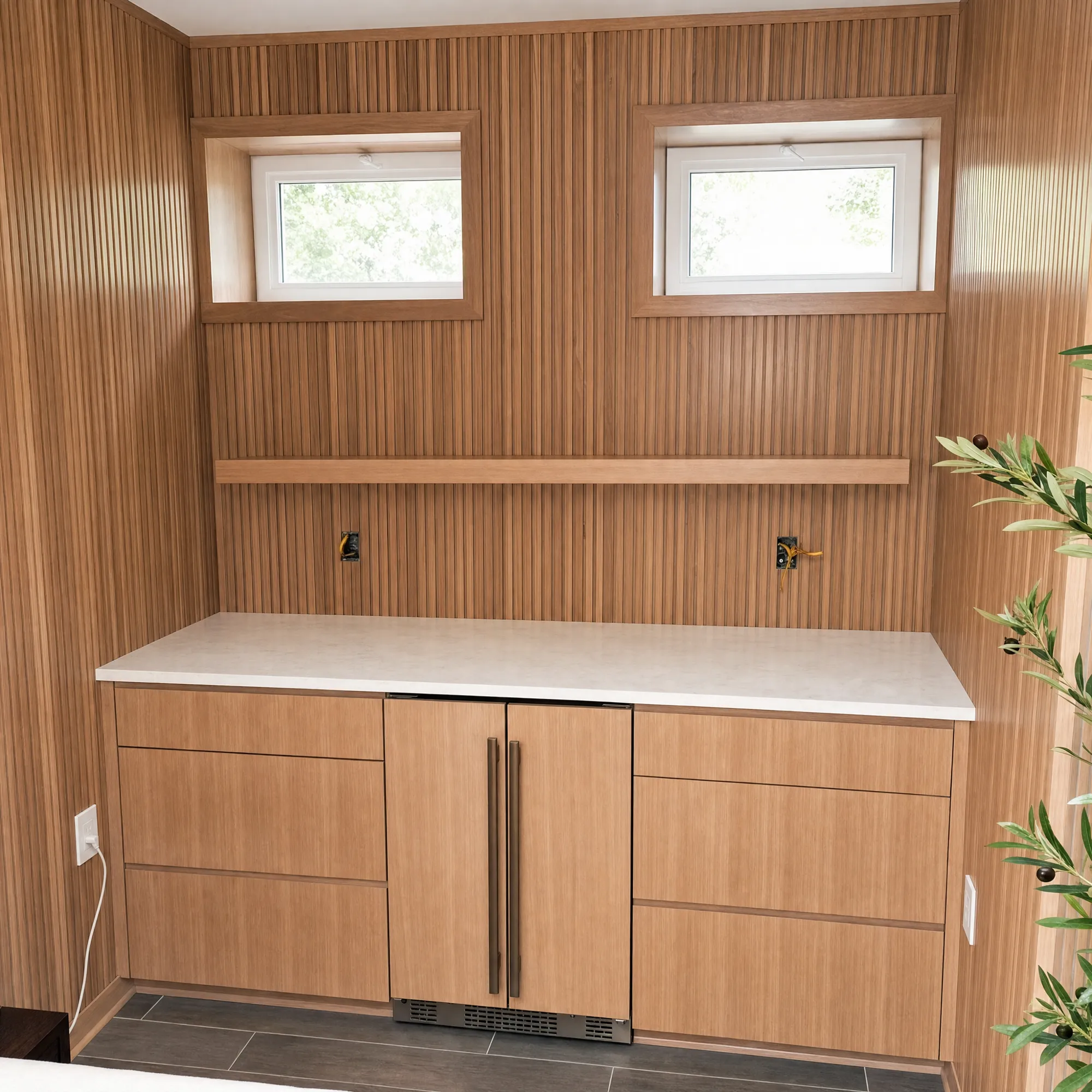 Custom wood slat accent wall by Fogg Carpentry